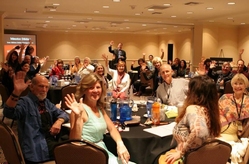 Hands up during an intensive workshop