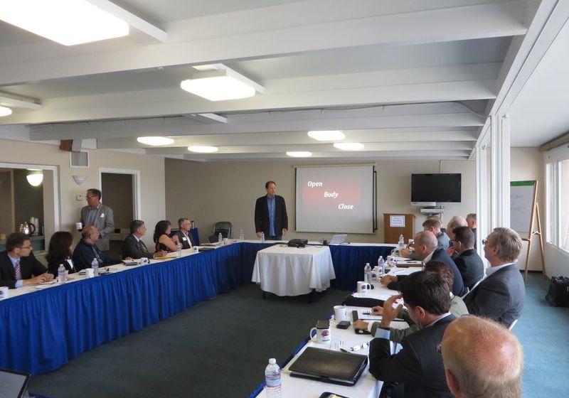 A leadership session around the boardroom table